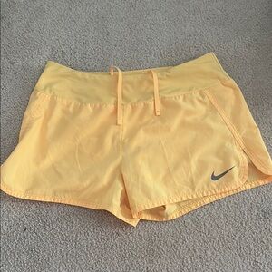 Nike Yellow Athletic Shorts with Moisture-Wicking Fabric
